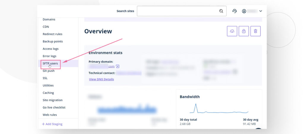 WP Engine's User Portal. An arrow highlights the button to access the SFTP Users section