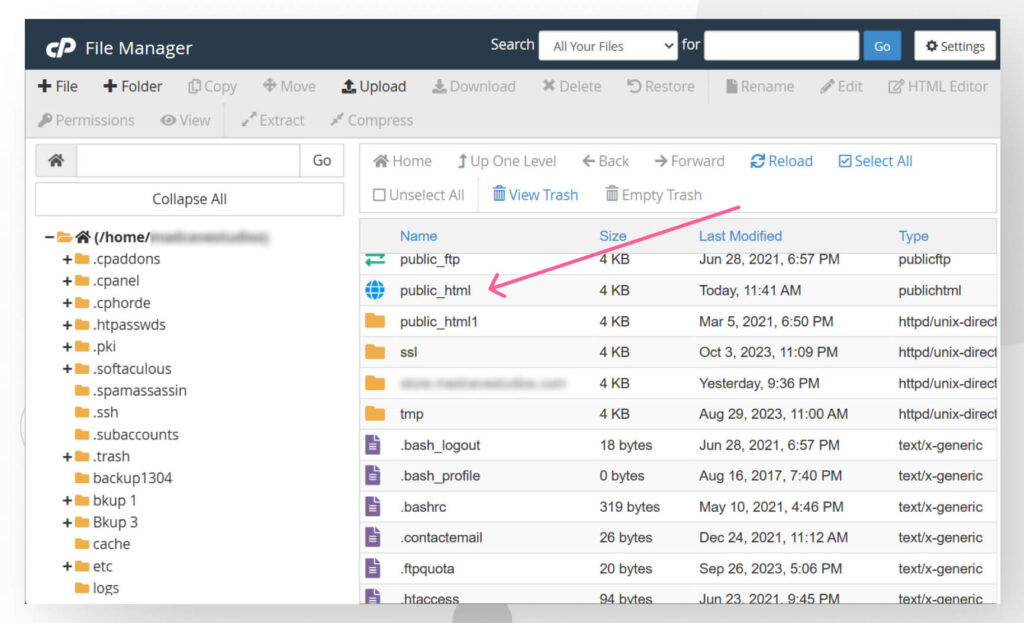 screenshot of cPanel's File Manager with an arrow pointing toward public_html