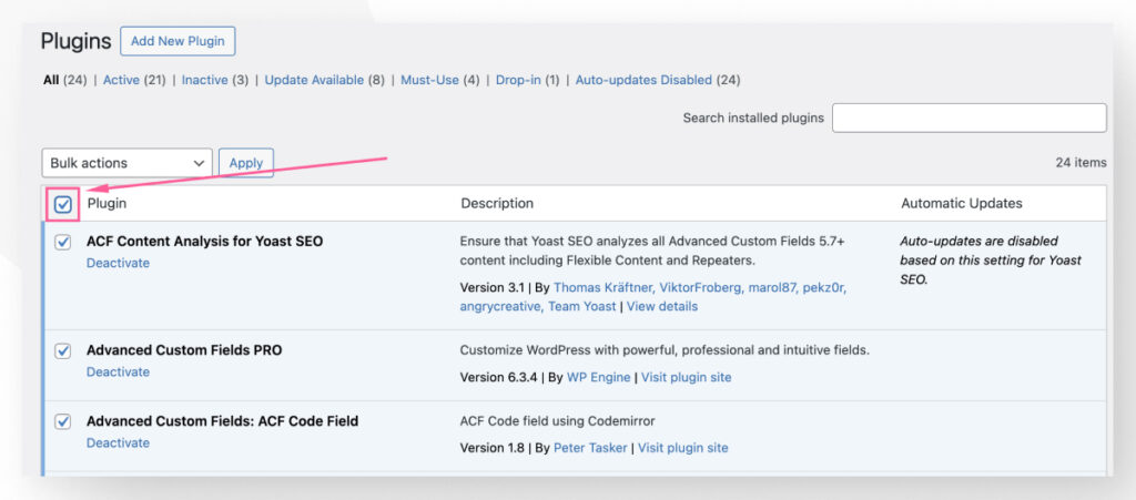 The Installed Plugins interface in WordPress. An arrow highlights the checkbox to select all plugins