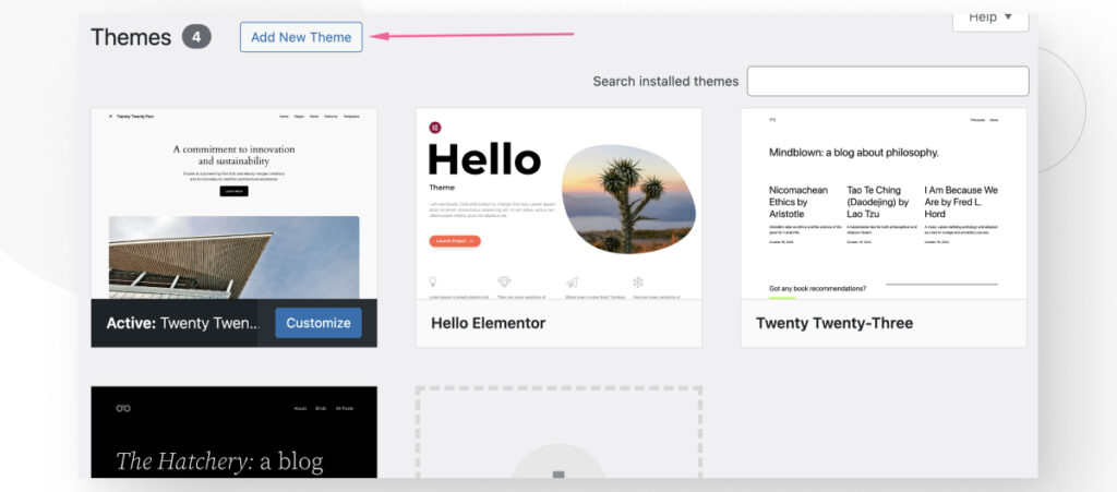 The WordPress admin interface. The user is in the Themes section. An arrow points to the "Add New Theme" button