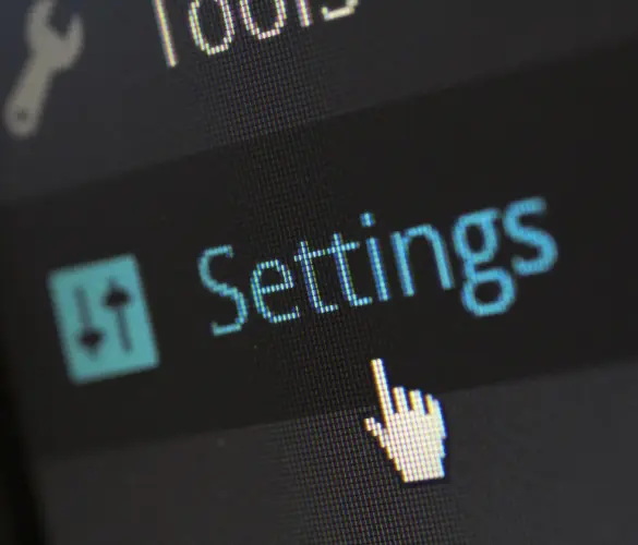 a closeup of WordPress's admin dashboard. The mouse pointer is hovering over the Settings button on the left-hand sidebar