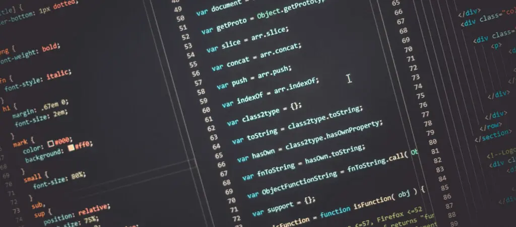 colorful JavaScript, CSS, and HTML code over a black computer screen background