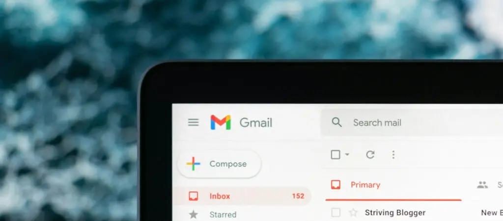 a closeup of the corner of a computer screen displaying a Gmail inbox