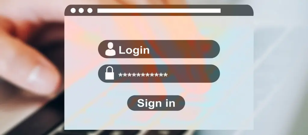 a hand typing on a computer keyboard with a login form overlayed on top