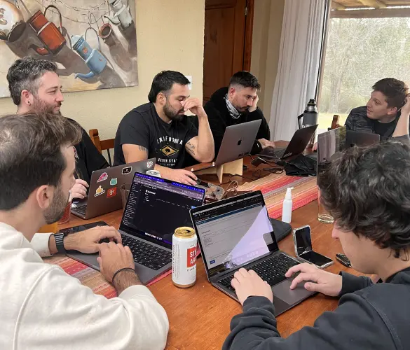 a team of WordPress developer working on a desk