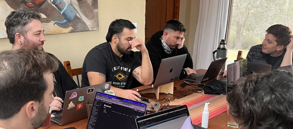 a team of WordPress developer working on a desk